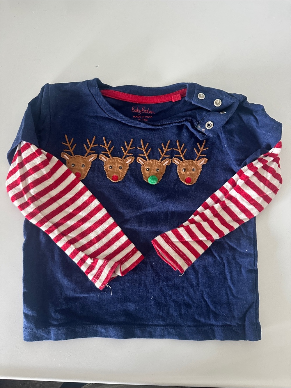 Baby Boden Navy Long-Sleeve Top with Striped Red Sleeves and Reindeer